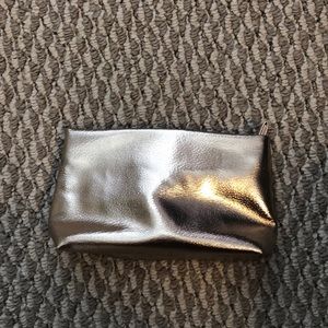Gold makeup bag